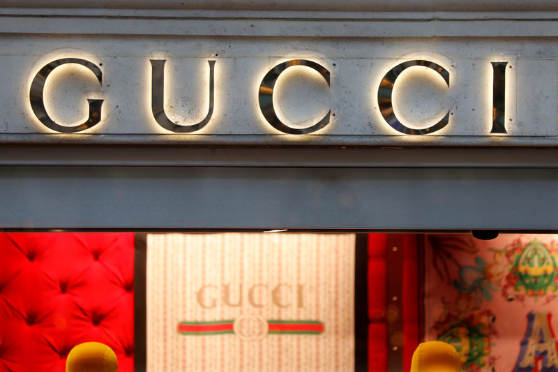 © Reuters. FILE PHOTO: A Gucci sign is seen outside a shop in Paris