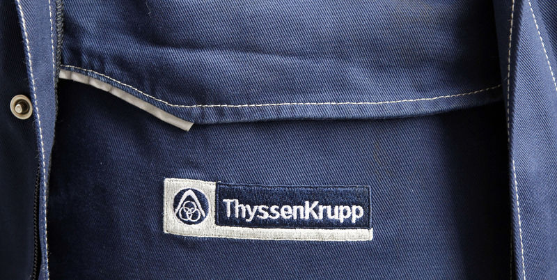 © Reuters. Logo of ThyssenKrupp AG Elevator section is pictured on the uniform of a company service engineer in Berlin