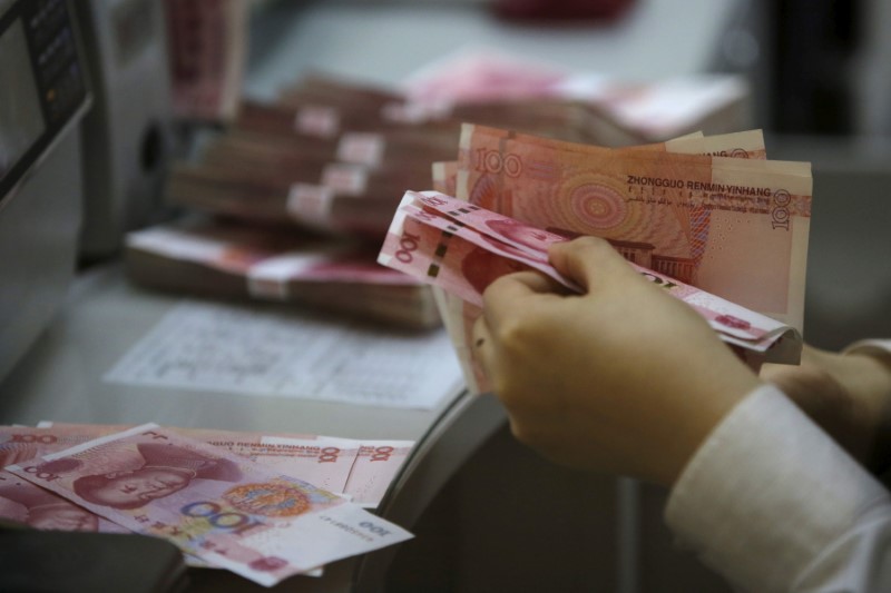 © Reuters. اليوان الصيني ينخفض لأدنى مستوى منذ بداية العام