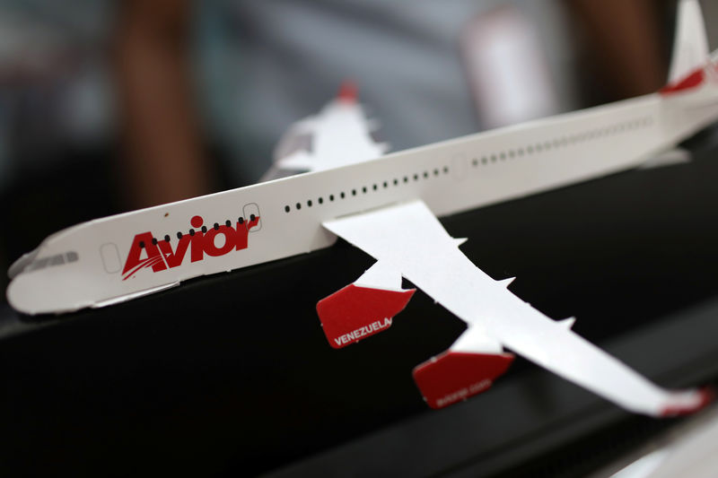 © Reuters. The corporate logo of Avior Airlines is seen in a scale model airplane at their office in Caracas