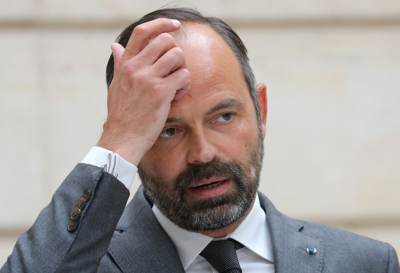 © Reuters. PHILIPPE DÉMENT TOUTE TENTATIVE "D'INTIMIDATION" CONTRE DISCLOSE