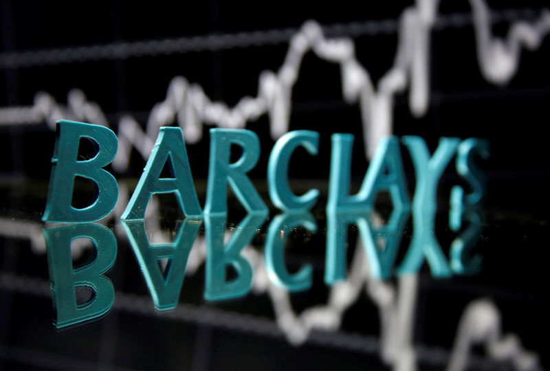 © Reuters. FILE PHOTO: The Barclays logo is seen in front of displayed stock graph in this illustration