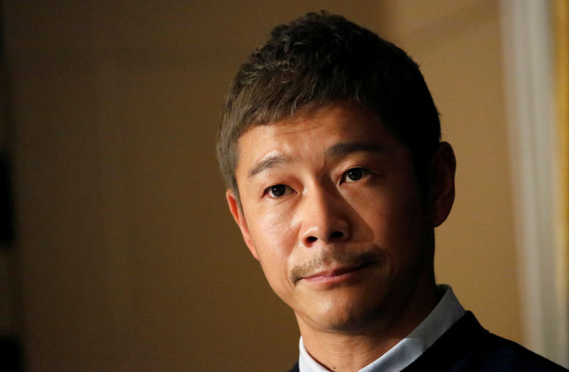 © Reuters. Japanese billionaire Yusaku Maezawa, founder and chief executive of online fashion retailer Zozo, who has been chosen as the first private passenger by SpaceX, attends a news conference at the Foreign Correspondents' Club of Japan in Tokyo