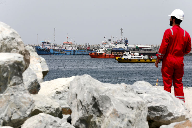 © Reuters. FILE PHOTO: A technical staff is seen at the Port of Fujairah