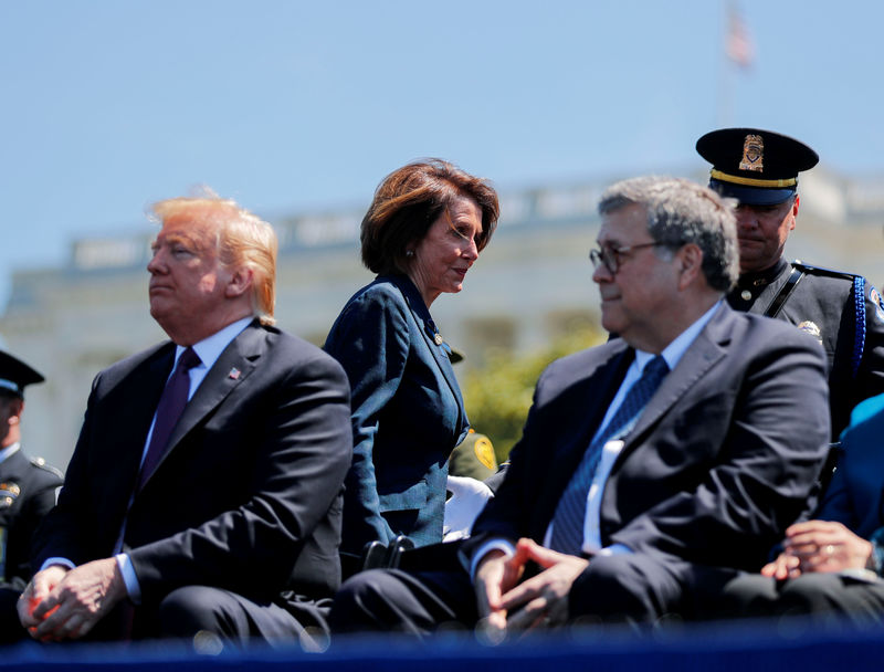 © Reuters. FILE PHOTO: Speaker of the House Pelosi walks behind President Trump and Attorney General Barr as they attend National Peace Officers Memorial Service on Capitol Hill in Washington