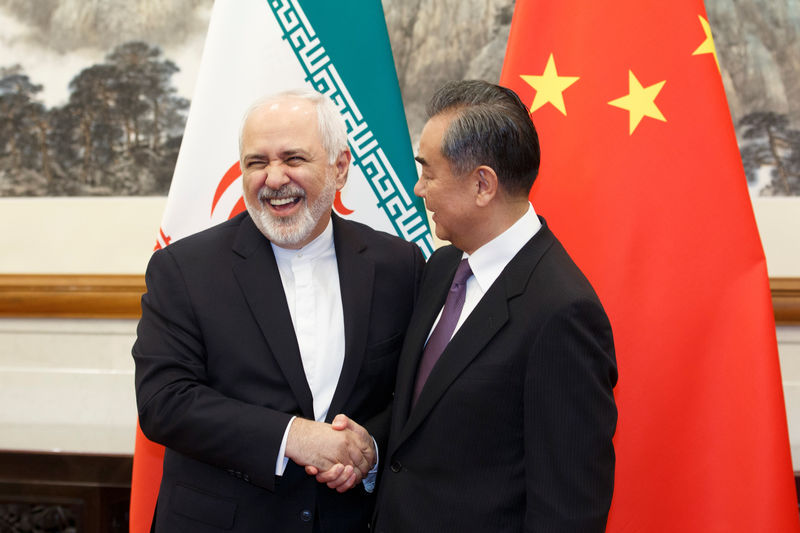 © Reuters. وزير خارجية الصين يقول إن بلاده تعارض العقوبات الأمريكية على إيران