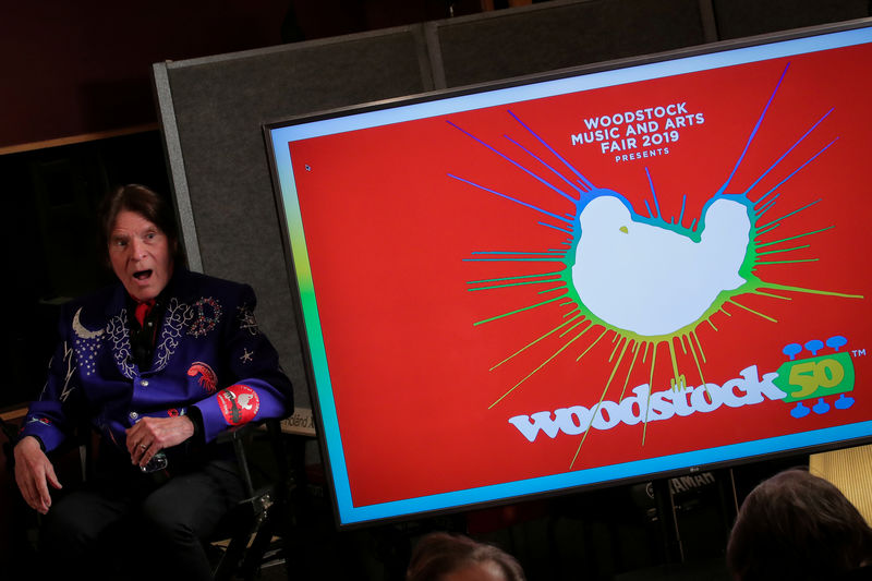 © Reuters. FILE PHOTO: Singer John Fogerty speaks during the announcement event for the lineup for the Woodstock 50th Anniversary concert in New York
