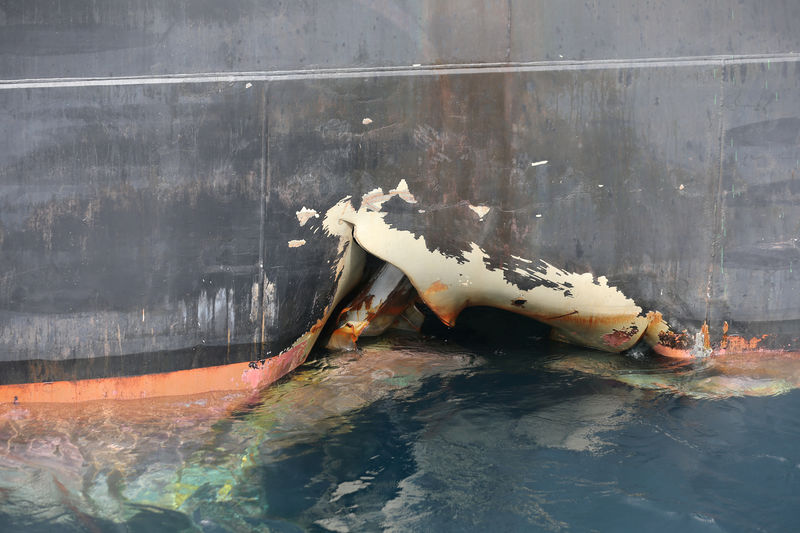 © Reuters. FILE PHOTO: A damaged ANDREA VICTORY ship is seen off the Port of Fujairah