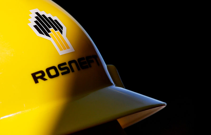 © Reuters. FILE PHOTO: A view shows a helmet with the logo of Rosneft company in Vung Tau