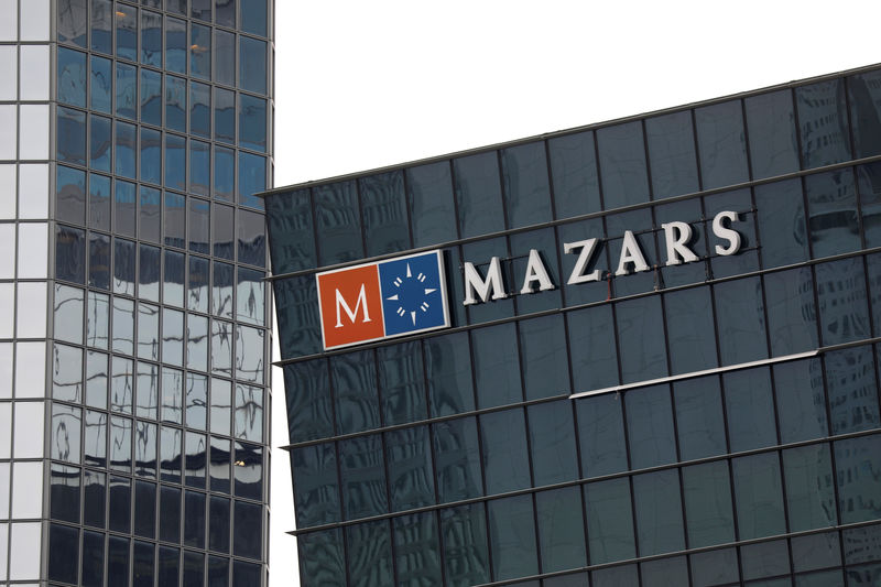 © Reuters. FILE PHOTO:  The logo of Mazars, an international, integrated organisation, that is specialised in audit, accounting, tax and advisory services is seen on a building in the financial district of la Defense near Paris