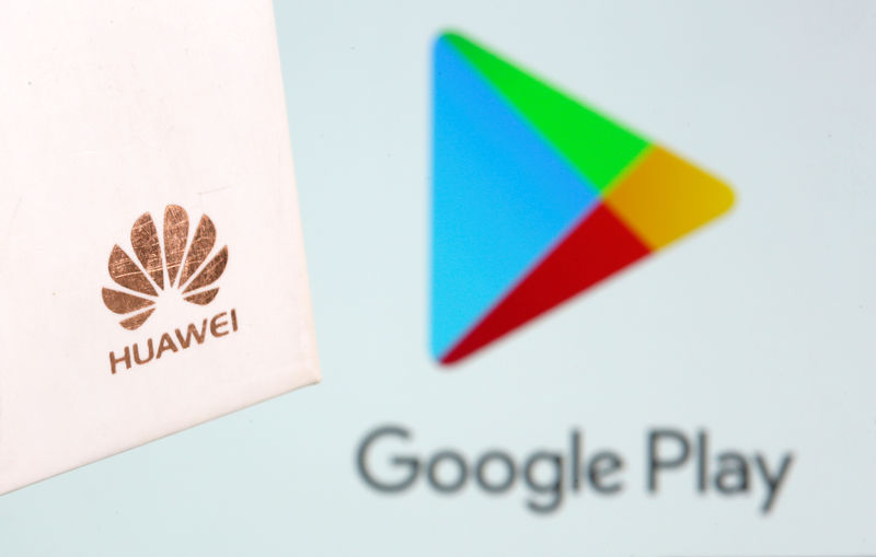 © Reuters. Huawei logo is seen in front of displayed Google Play logo in this illustration taken