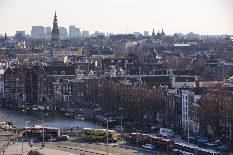 © Reuters. A rootop view of Amsterdam from SkyLounge on the 11th floor of the DoubleTree by Hilton Hotel in Amsterdam