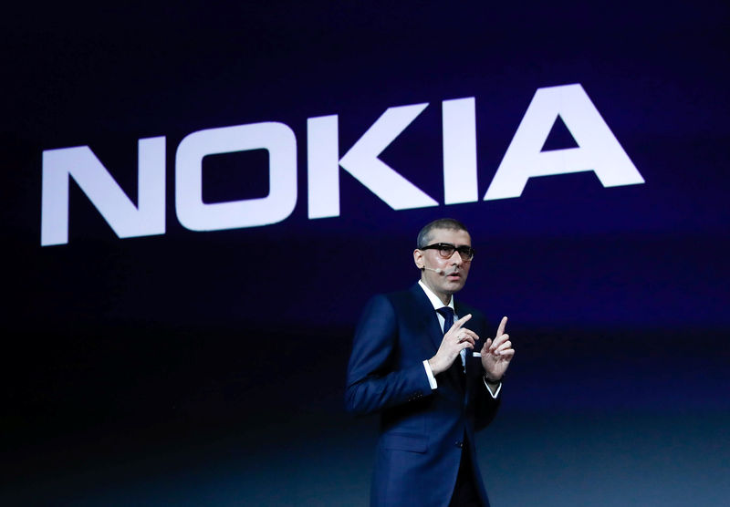 © Reuters. Rajeev Suri, Nokia's President and Chief Executive Officer, speaks during the Mobile World Congress in Barcelona