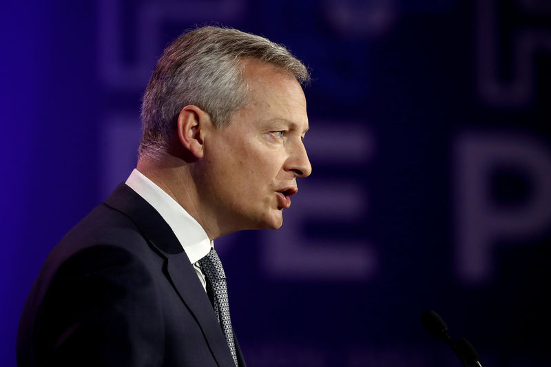 © Reuters. FILE PHOTO: French Economy and Finance Minister Bruno Le Maire delivers a speech during a high-level forum on debt at the Finance ministry in Paris