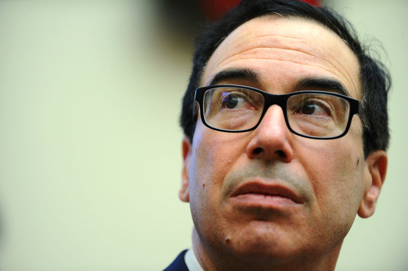 © Reuters. FILE PHOTO: Treasury Secretary Steven Mnuchin testifies before the House Financial Services Committee hearing