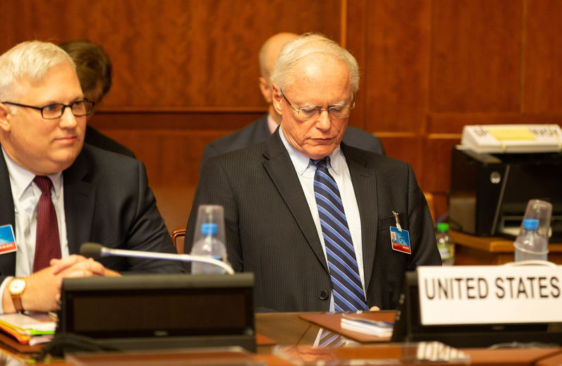 © Reuters. FILE PHOTO: U.S. special envoy for Syria James Jeffrey (R) attends a meeting during the consultations on Syria, at the European headquarters of the United Nations in Geneva