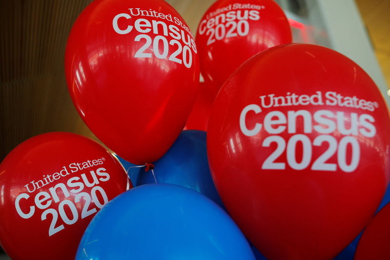 © Reuters. FILE PHOTO: Balloons decorate an event for community activists and local government leaders to mark the one-year-out launch of the 2020 Census efforts in Boston