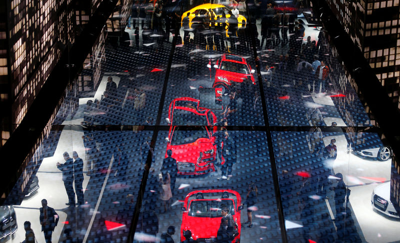 © Reuters. The stand of German car manufacturer Audi is reflected in the ceiling during a media preview day at the Frankfurt Motor Show (IAA)