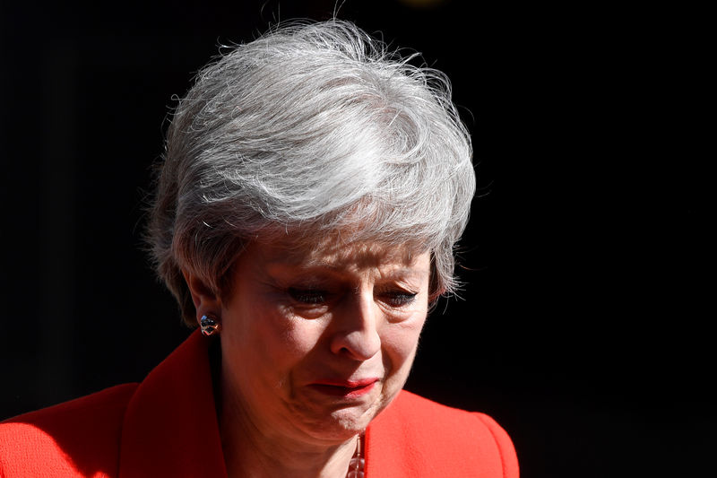 © Reuters. British Prime Minister Theresa May reacts as she delivers a statement in London