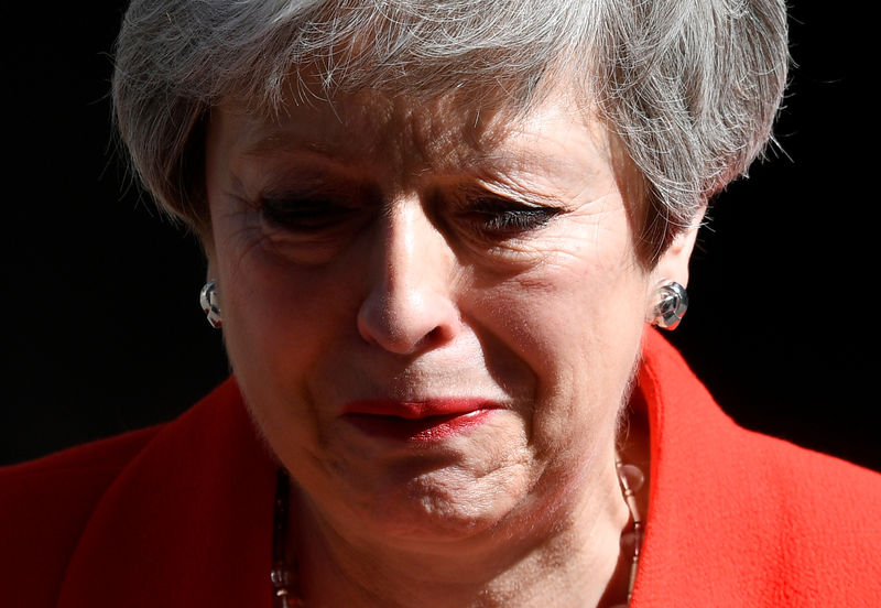 © Reuters. British Prime Minister Theresa May reacts as she delivers a statement in London