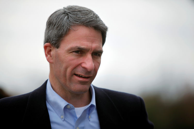 © Reuters. FILE PHOTO: Virginia Republican gubernatorial nominee Ken Cuccinelli talks with supporters at a polling place at Smith Station Elementary School in Spotsylvania