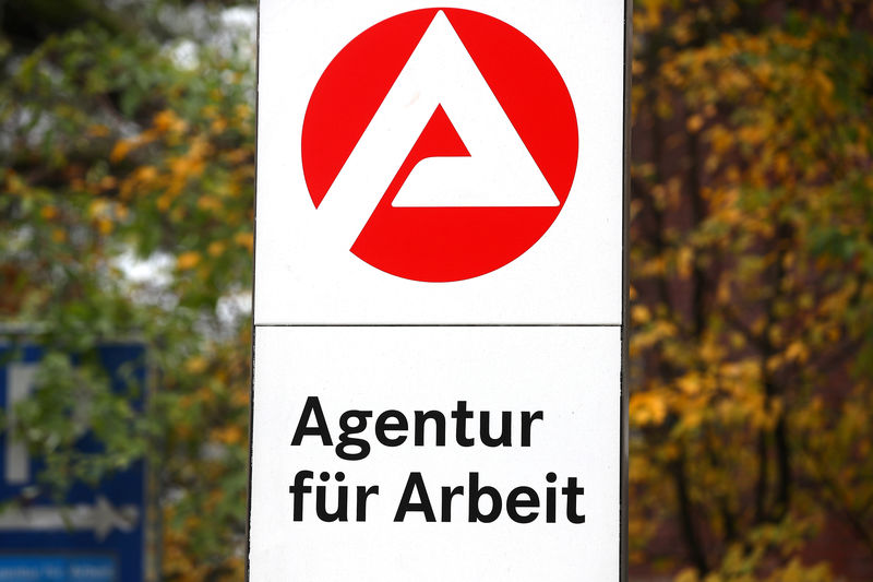© Reuters. FILE PHOTO: A sign leading to a job centre of Germany's Federal Labour Office is pictured in Munich