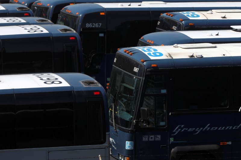© Reuters. Greyhound buses are lined up in New York City