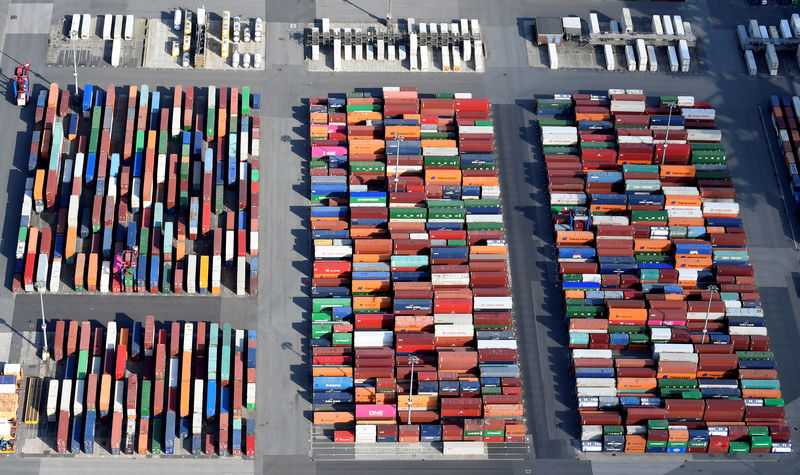 © Reuters. Aerial view of containers at a loading terminal in the port of Hamburg