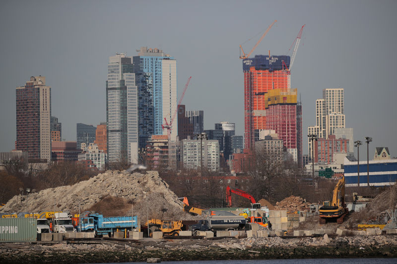 © Reuters. Cranes are seen among construction equipment in the Brooklyn borough of New York City