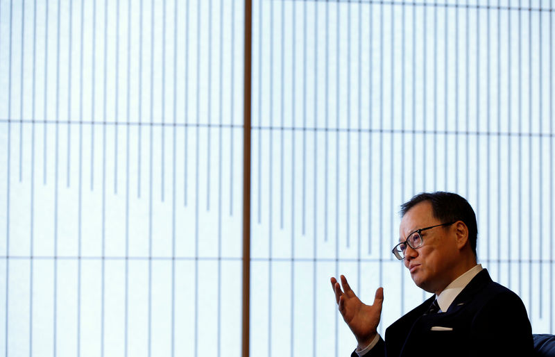 © Reuters. Mizuho Financial Group's Chief Executive Officer Tatsufumi Sakai attends an interview with Reuters at the company's headquarters in Tokyo