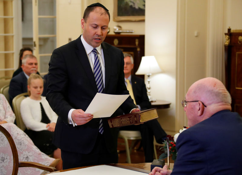 © Reuters. The new Treasurer Josh Frydenberg attends the swearing-in ceremony in Canberra