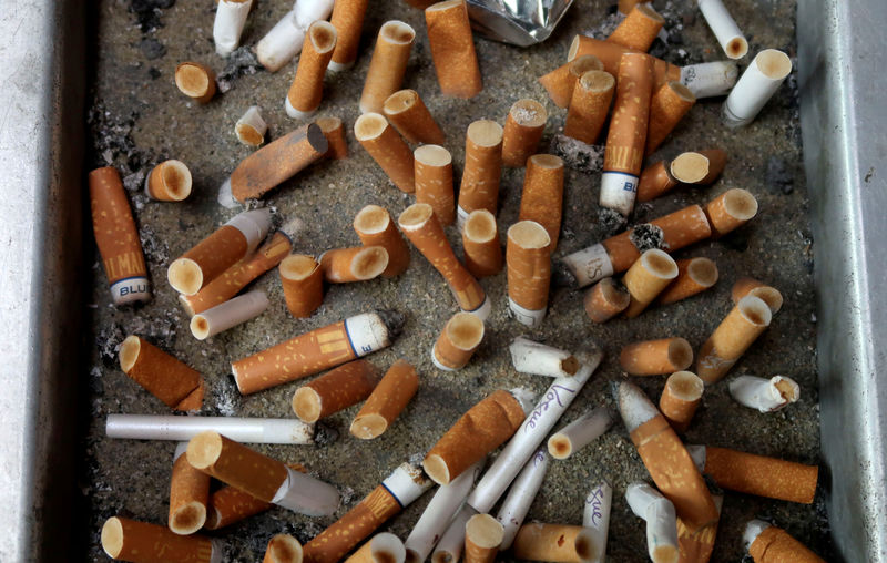 © Reuters. FILE PHOTO: Discarded cigarette butts are pictured at the German SPD party headquarters in Berlin