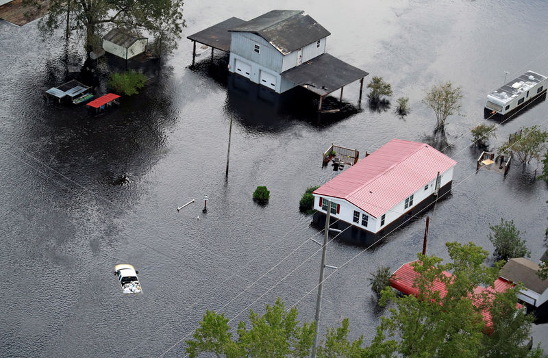 © Reuters. FILE PHOTO: Houses sit in floodwater caused by Hurricane Florence, in this aerial picture near Lumberton