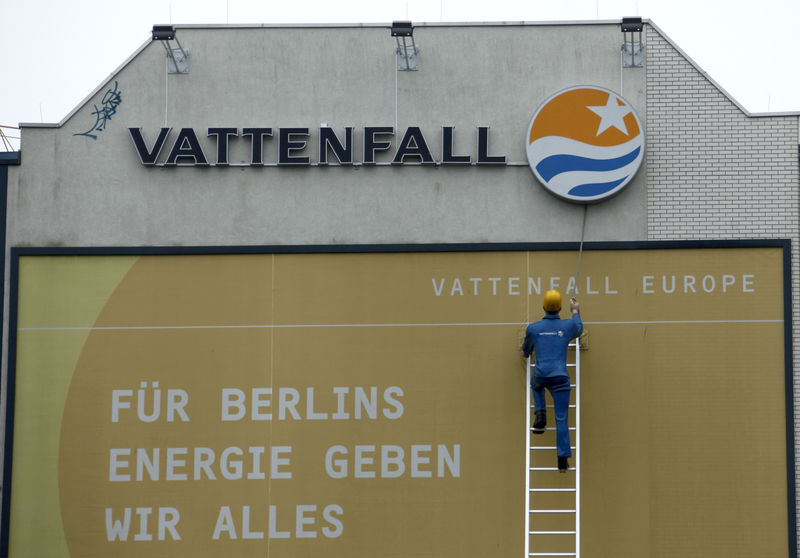© Reuters. An advertisement of Vattenfall with figure of a worker on a long ladder climbing to a Vattenfall logo is pictured in Berlin