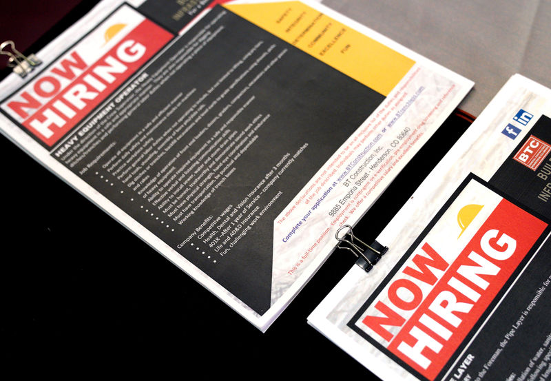 © Reuters. FILE PHOTO: Brochures are displayed for job seekers at the Construction Careers Now! hiring event in Denver