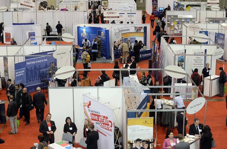 © Reuters. Overhead view of 2014 Spring National Job Fair and Training Expo in Toronto