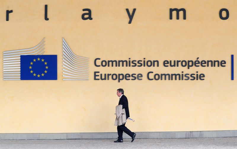 © Reuters. A man walks past the European Commission Headquarters in Brussels