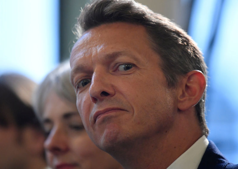 © Reuters. FILE PHOTO: The Chief Economist of the Bank of England, Andy Haldane, listens from the audience at an event at the Bank of England in the City of London