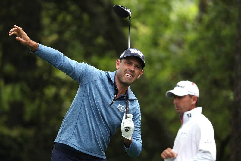 © Reuters. Charl Schwartzel of South Africa reacts to his shot off the second tee during first round play of the 2019 Master golf tournament at Augusta National Golf Club in Augusta, Georgia, U.S.