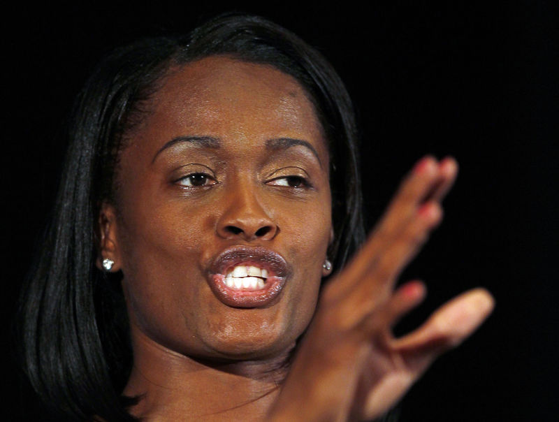 © Reuters. FILE PHOTO: Swin Cash an Olympic basketball and WNBA player for the Chicago Sky speaks during the Beyond Sport United summit at Yankee Stadium in New York