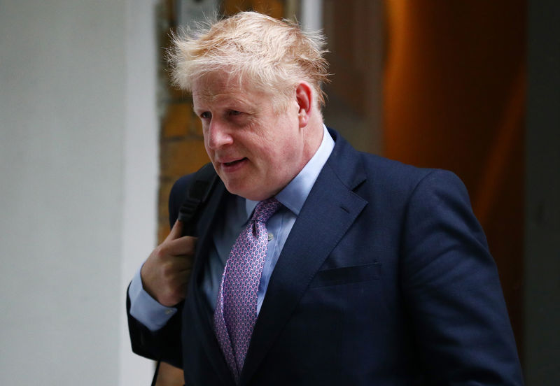 © Reuters. Former British Foreign Secretary Boris Johnson leaves his home in London