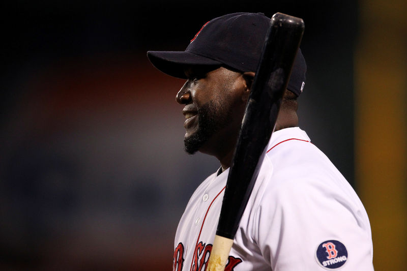 © Reuters. FILE PHOTO: Boston Red Sox's Ortiz smiles during warmups before facing the Toronto Blue Jays in their MLB American League East baseball game in Boston