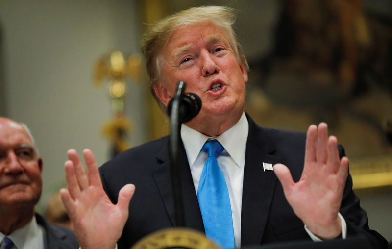 © Reuters. FILE PHOTO: U.S. President Trump speaks during White House event in Washington