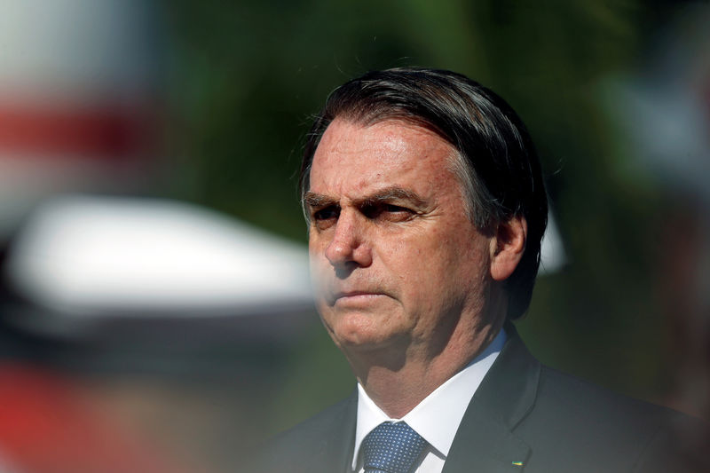 © Reuters. Brazil's President Jair Bolsonaro looks on during a ceremony of the 154nd anniversary of the Riachuelo Naval Battle at the Marine Corps Headquarters in Brasilia