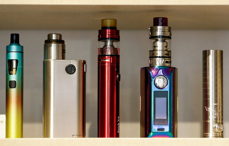 © Reuters. E-cigarettes are placed on a shelf for sale in a store in Prague