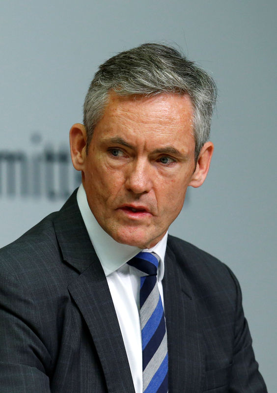 © Reuters. FILE PHOTO: Coen, General Secretary of the Basel Committee on Banking Supervision attends a news conference at the ECB headquarters in Frankfurt