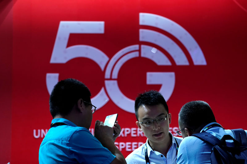 © Reuters. A sign advertising 5G is seen at CES (Consumer Electronics Show) Asia 2019 in Shanghai