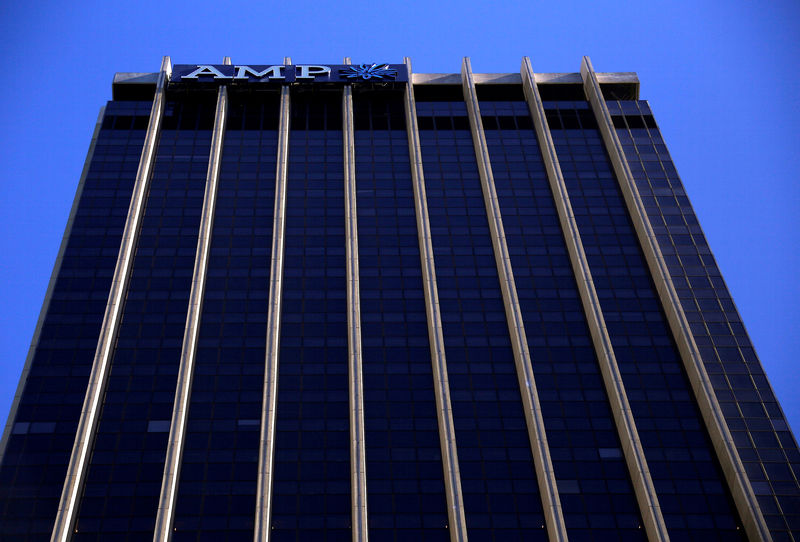 © Reuters. FILE PHOTO: The logo of Australia's biggest wealth manager, AMP Ltd, adorns their head office building in Sydney