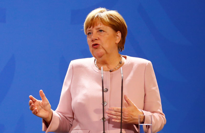 © Reuters. FILE PHOTO: German Chancellor Angela Merkel and Abu Dhabi's Crown Prince Mohammed bin Zayed al Nahyan attend a news conference at the Chancellery in Berlin