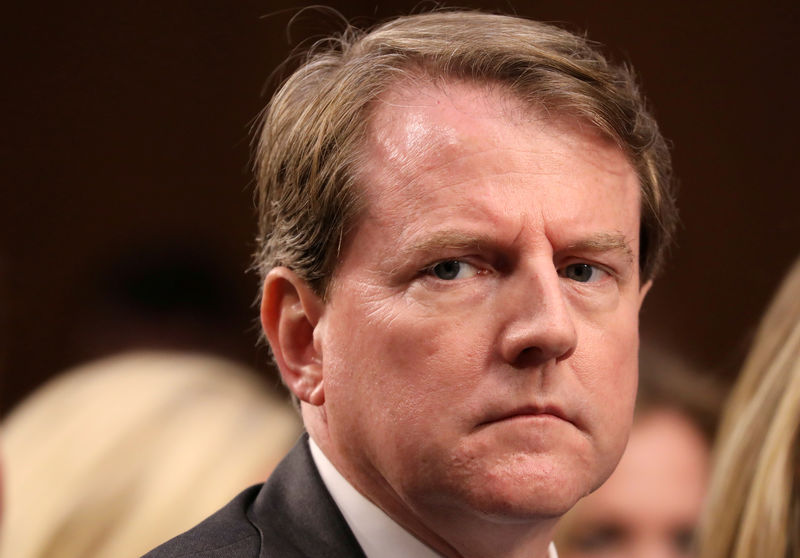 © Reuters. FILE PHOTO: White House Counsel Don McGahn listens during the confirmation hearing for U.S. Supreme Court nominee Kavanaugh on Capitol Hill in Washington